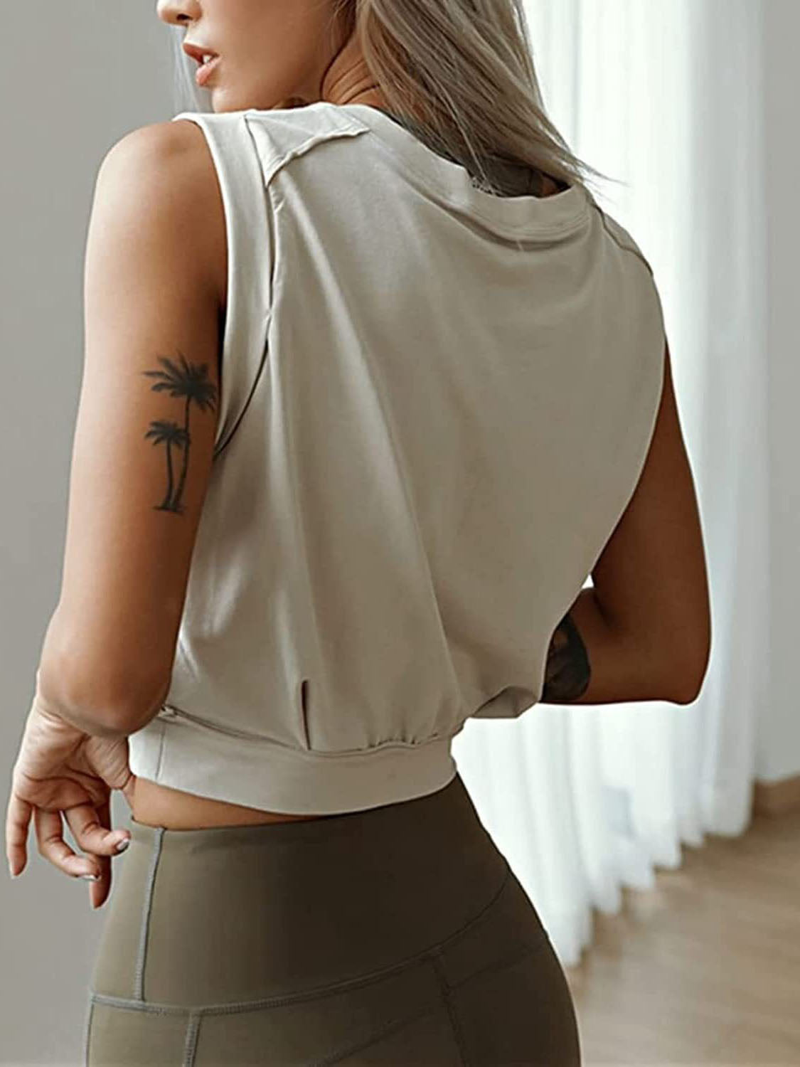 WE'RE ALL IN THIS TOGETHER HOSTAGES OF THE GYM SLEEVELESS CROP TOPS